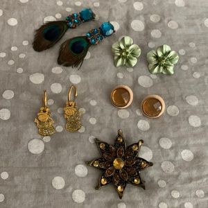 Fashion earrings and pin.